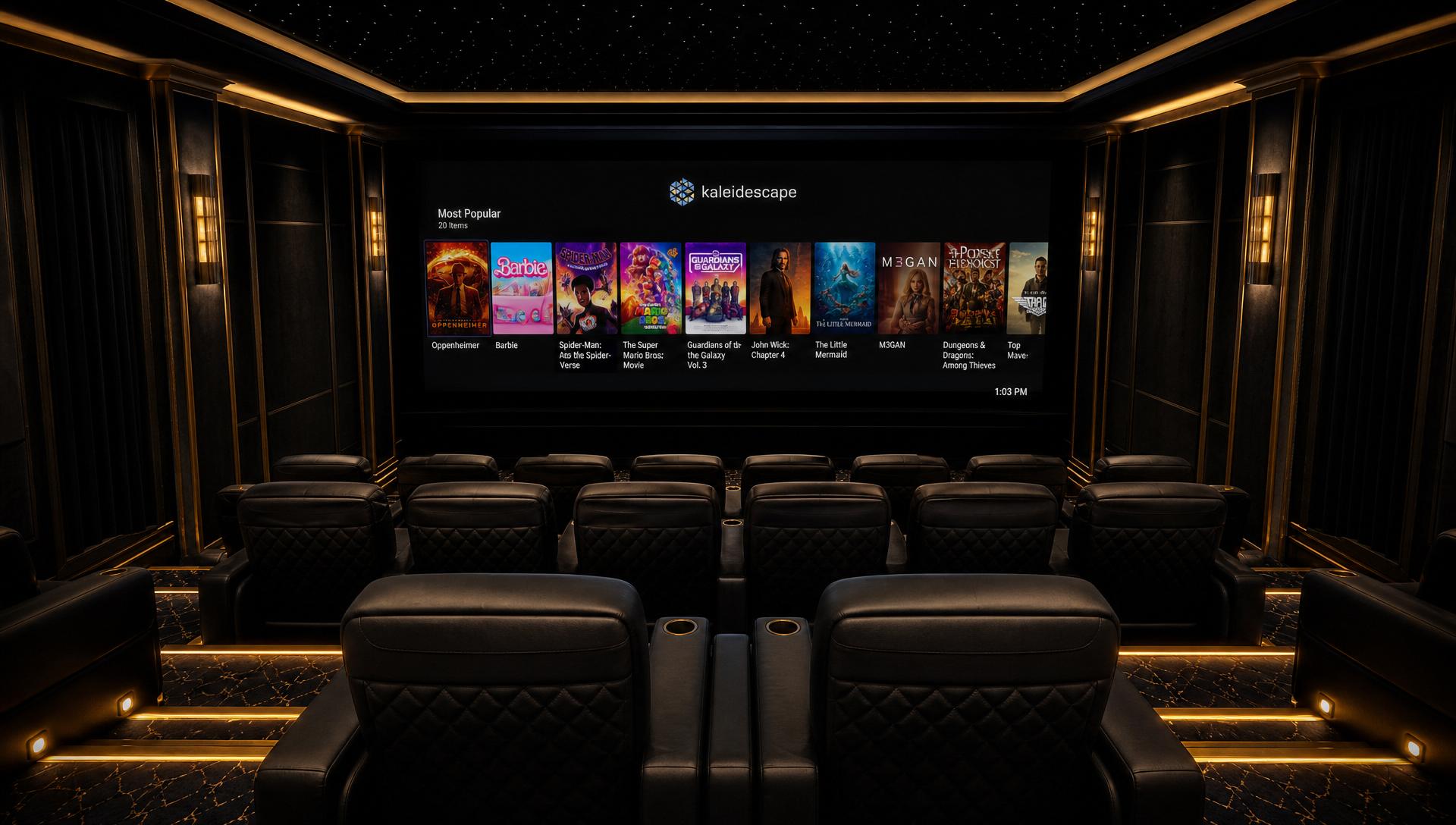 Luxury private cinema viewed from behind tiered leather seating facing a Kaleidescape movie carousel on screen